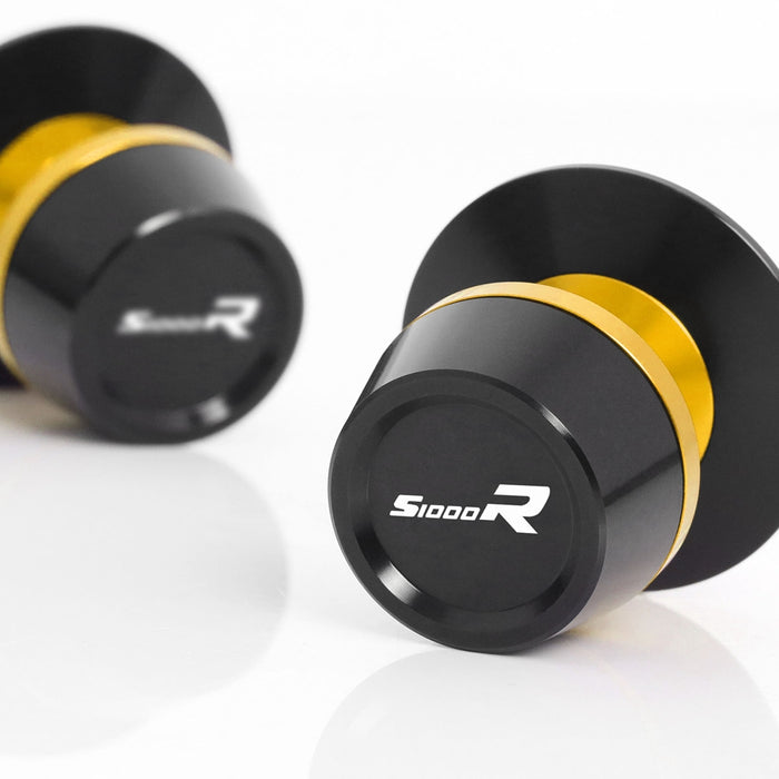 BMW S1000R naked swingarm spools by MC Motoparts, engraved S-Fight logo, 8mm mounting for motorcycle rear axle.