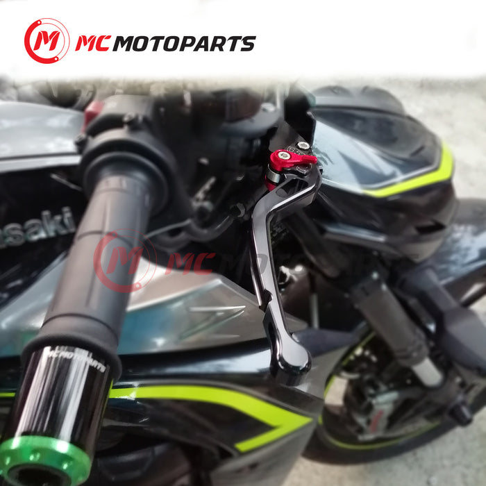 Black CNC short adjustable brake and clutch lever for Honda CB500F, CB500X, CBR300R, and CBR500R by MC Motoparts.