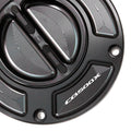 Honda CB500X 2016-2024 MC Motoparts keyless engraved fuel tank cap, black metal with logo, for secure sealing and style.