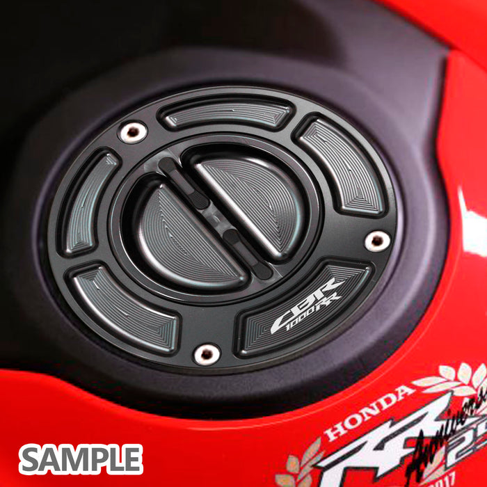 Honda CBR650R 2019-2023 keyless fuel tank cap with MC Motoparts logo, engraved, installed on motorcycle fuel tank.