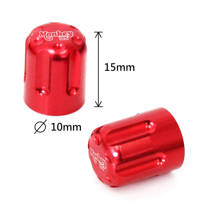 Honda Monkey 125 engraved logo tire valve stem caps by MC Motoparts, featuring a red design and durable metal construction.
