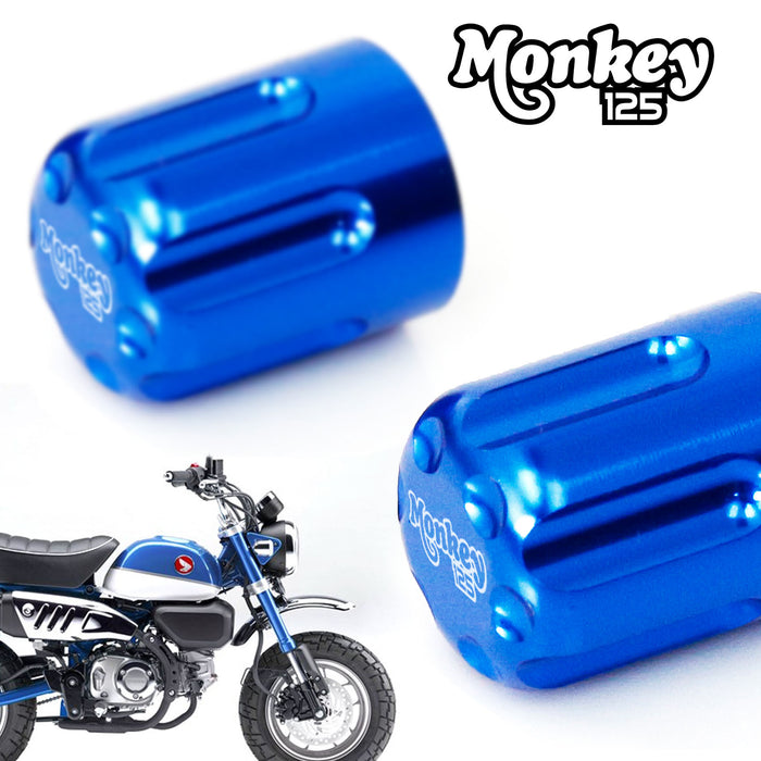 Blue Honda Monkey 125 engraved logo tire valve stem caps by MC Motoparts, featuring detailed logo engraving on metal caps.