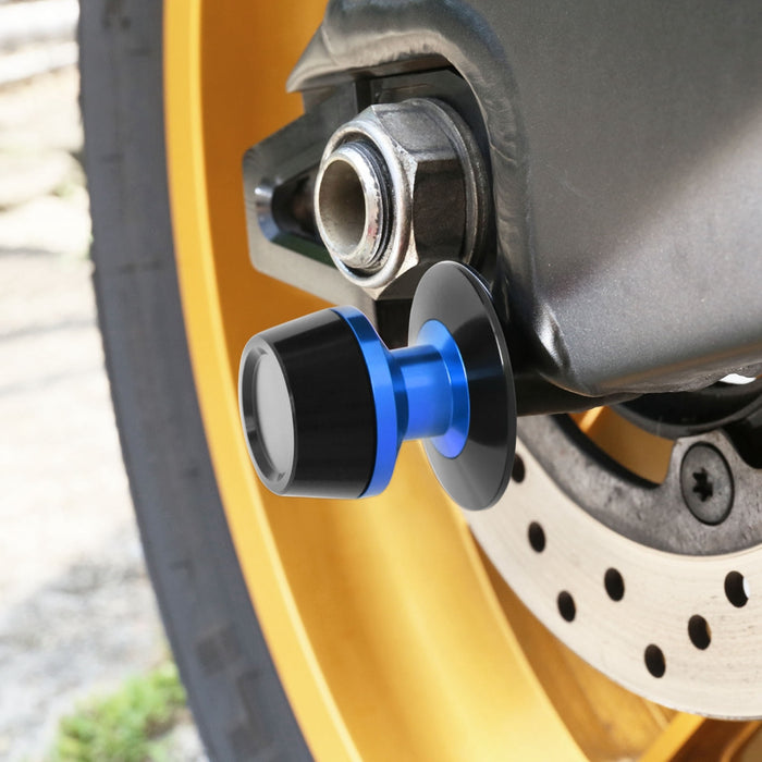 Kawasaki Ninja 300 ZX6R MC Motoparts engraved 8mm swingarm spools for motorcycle wheel removal and stability.
