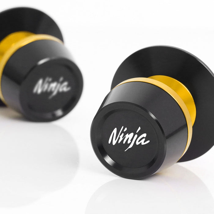 Kawasaki Ninja 300 ZX6R MC Motoparts engraved logo 8mm swingarm spools for motorcycle stability and protection.