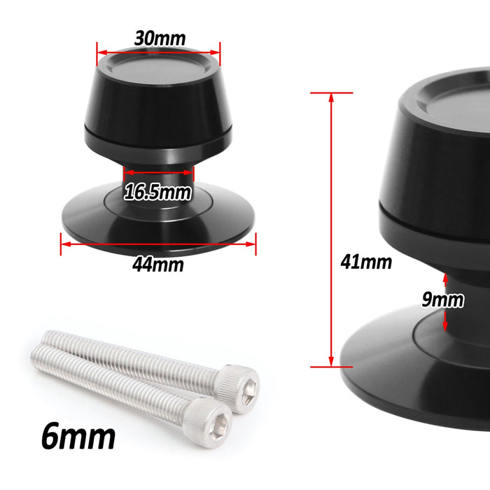Black MC Motoparts Yamaha MT-09 Tracer swingarm spools with engraved logo, 6mm diameter, shown mounted on motorcycle swingarm.