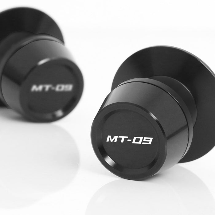 MC Motoparts Yamaha MT-09 Tracer swingarm spools with engraved logo, 6mm diameter, for easy motorcycle wheel removal.