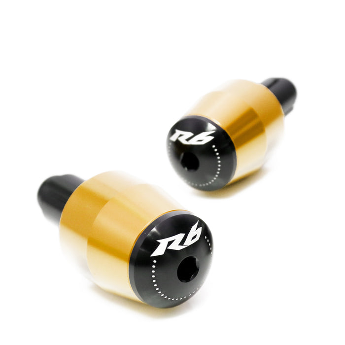 Yamaha R6 engraved logo handlebar ends by MC Motoparts, gold-colored bar ends with engraved branding on motorcycle handlebars.