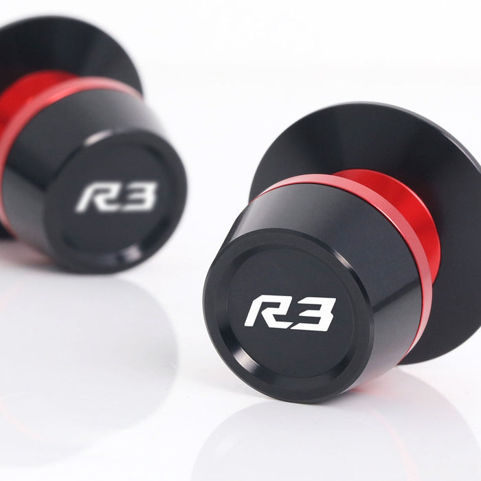 MC Motoparts Yamaha YZF R3 swingarm spools with engraved logo, 6mm size, designed for model years 2015-2024.