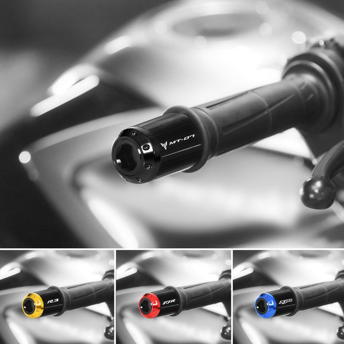 Black engraved Yamaha YZF R6 2006-2024 MC Motoparts Atom bar ends installed on motorcycle handlebars.