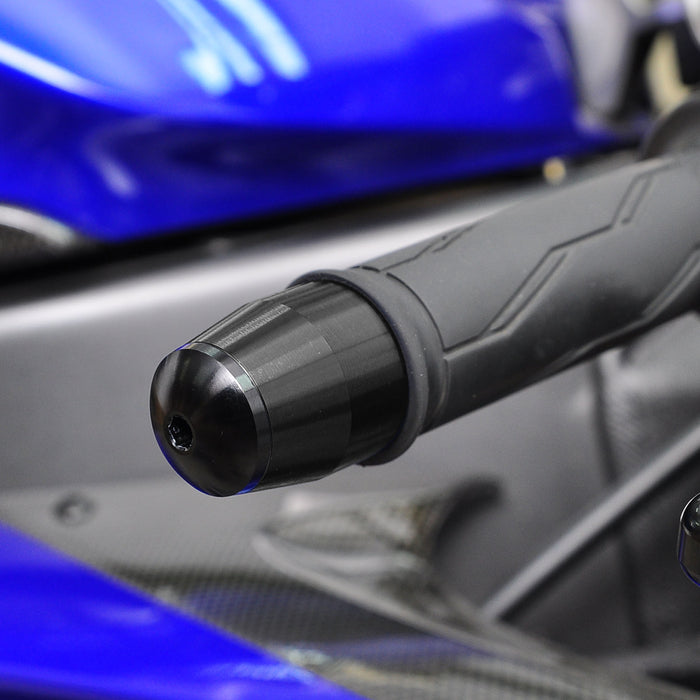 Black CNC bar ends for Benelli TRE1130K TNT 899 1130 LUX motorcycle, installed on handlebars for enhanced grip and style.