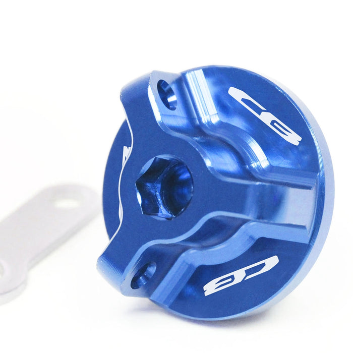 Blue engraved oil filler cap with Honda CB logo for CB1000R, CB500X, CB500F, and CB600F motorcycles by MC Motoparts.