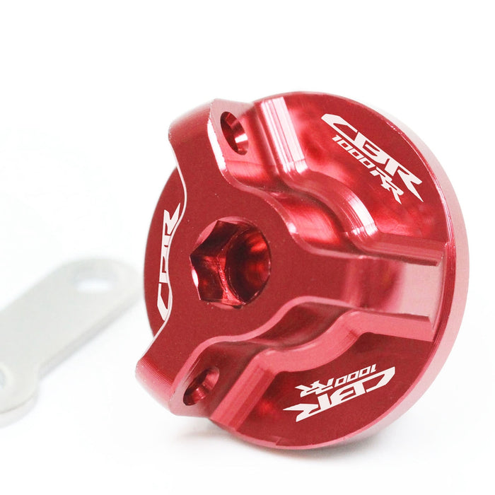 Honda CBR1000RR oil filler cap by MC Motoparts with engraved logo, fits 2004-2023 ABS model, made of durable metal.