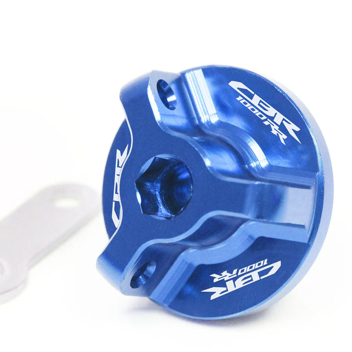 Blue engraved oil filler cap for Honda CBR1000RR with ABS, MC Motoparts logo, fits 2004-2023 motorcycle engine.
