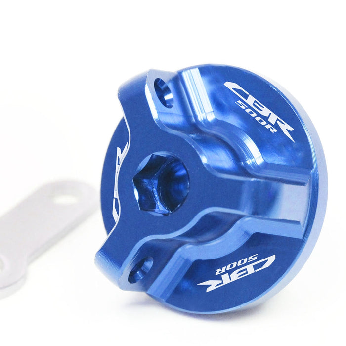 Blue engraved oil filler cap for Honda CBR500R 2013-2025 by MC Motoparts, featuring logo engraving on the cap.