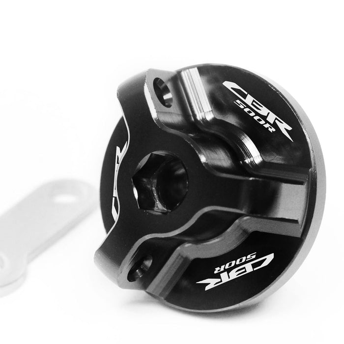 Honda CBR500R 2013-2025 oil filler cap with engraved logo by MC Motoparts, black metal design for engine oil fill opening.