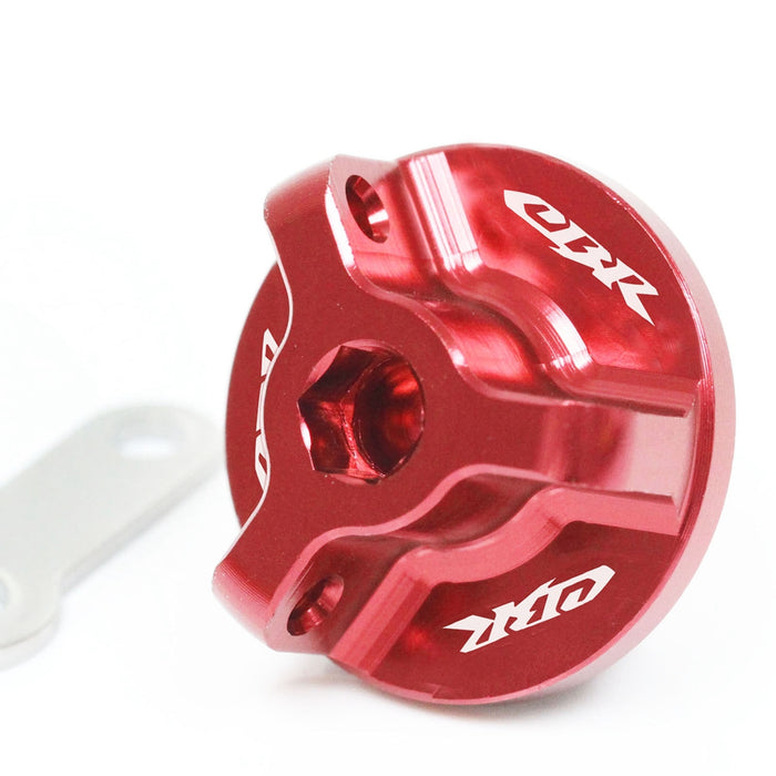 MC Motoparts engraved Honda CBR929RR, CBR954RR, CBR600F oil filler cap with logo design for motorcycle engine maintenance.
