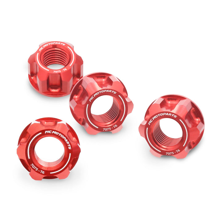 Set of four MC Motoparts billet M10 rear sprocket nuts for Honda Monkey 125, Grom 125, and Z125M motorcycle with spoke wheels.