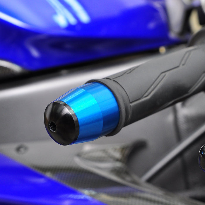 Black CNC bar ends for Honda NC 700, 750, Integra, Z125 motorcycle, designed by MC Motoparts, shown installed on handlebars.
