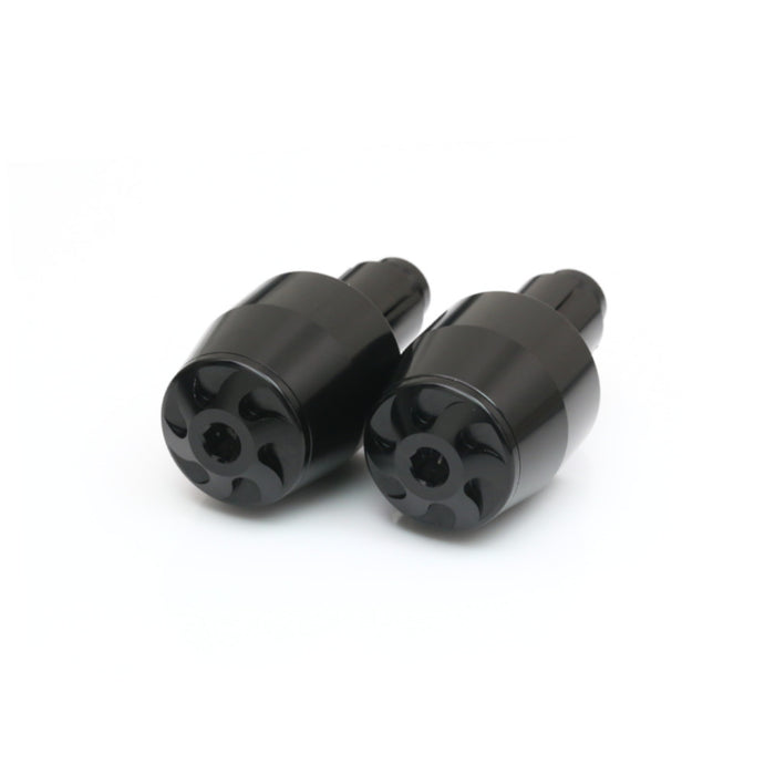 Black CNC bar ends for Triumph Daytona 675 and Street Triple 675, designed by MC Motoparts, featuring a BeyBlade style finish.