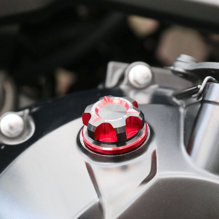 MC Motoparts CNC oil filler cap for Yamaha Tracer 9 GT, XSR900, MT-09, FZ09 motorcycle, black with red accents, installed on engine.
