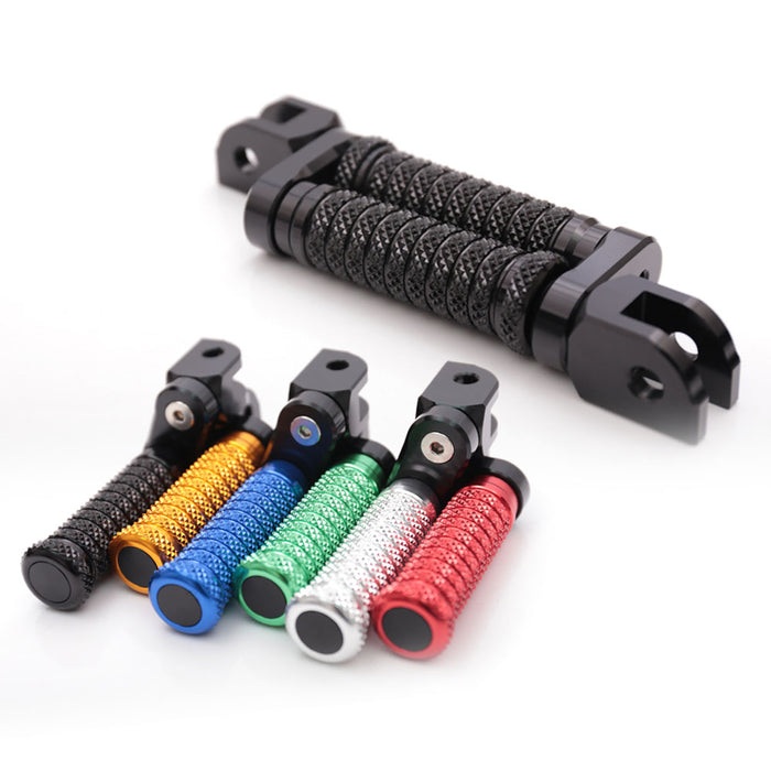 Black 25mm extension foot pegs for Aprilia Tuono V4R, 125, 660, 1000 models by MC Motoparts, adjustable for rider comfort.