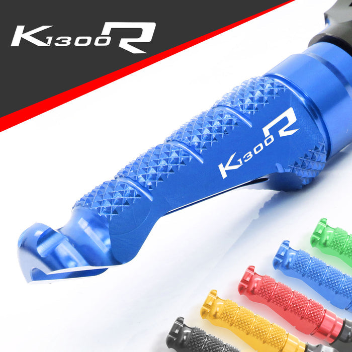 BMW K1300R and K1300S R-FIGHT engraved logo standard foot pegs by MC Motoparts, shown from the front angle.