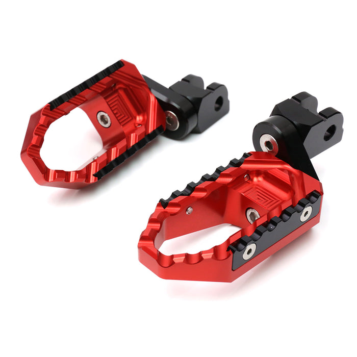 MC Motoparts 25mm extension foot pegs for Ducati Monster 821 and 1200 TRC, front view showing black metal extension and mounting points