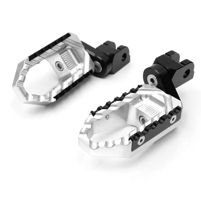 Black 25mm extension foot pegs for Ducati Monster 821 and 1200 TRC, by MC Motoparts, showing the extended touring foot peg design.