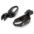 MC Motoparts 25mm extension foot pegs for Harley Davidson Fatboy TRC Touring, shown in black with extended design.