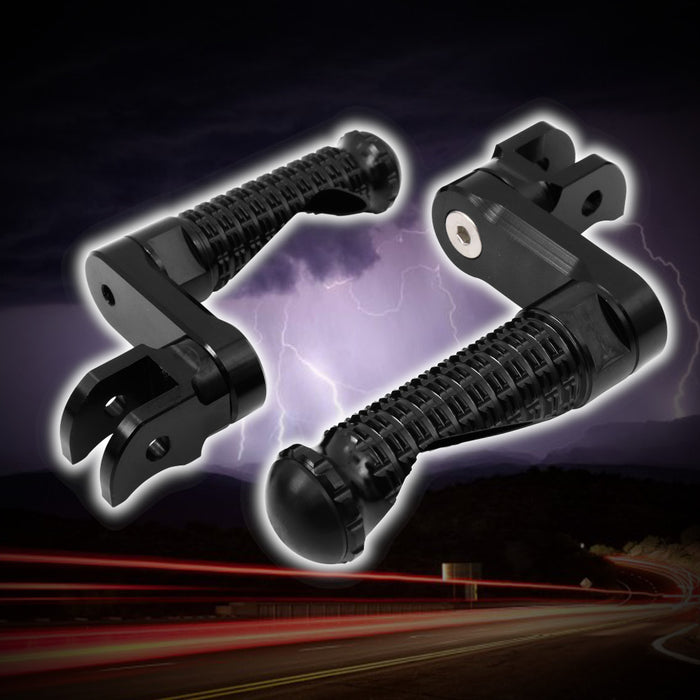 Black MC Motoparts 40mm extension foot pegs for Harley Davidson Softail Black Shadow, front view with textured metal surface.