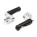 Black MC Motoparts 40mm extension foot pegs for Honda CBR600F and CBR600RR motorcycle, with mounting hardware visible in the image.