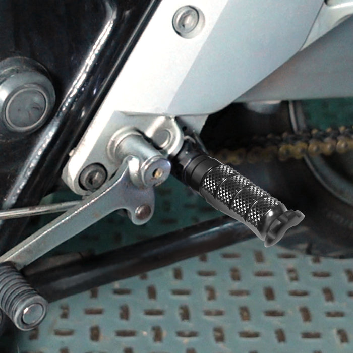 Front view of MC Motoparts standard black foot pegs for Kawasaki Z H2, Z1000, Z125, Z750, and Z900 motorcycle models.