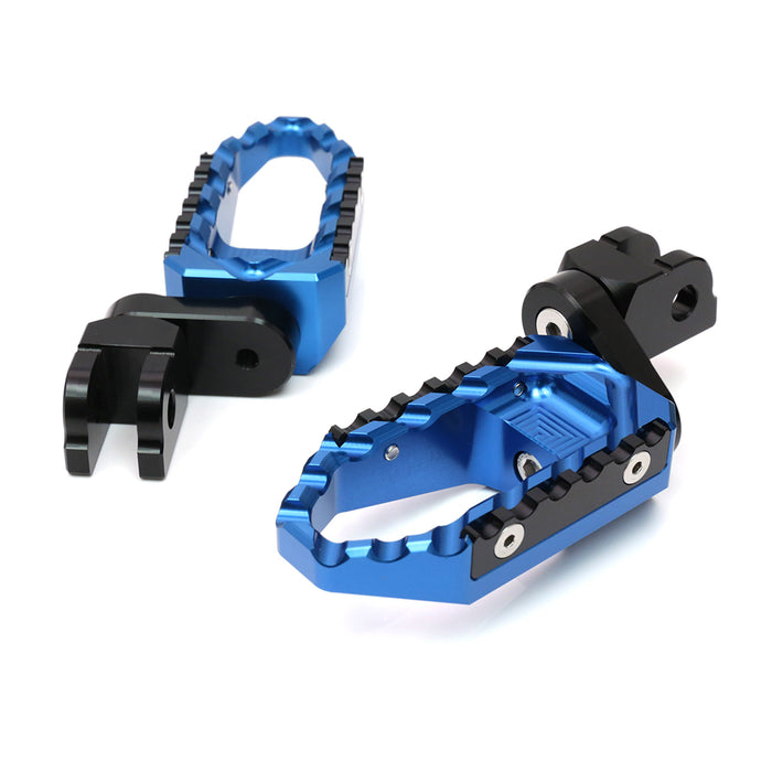 Black MC Motoparts 25mm extension touring foot pegs for Kawasaki ZX10R and ZX6R, showing the front view of the multi-step design.