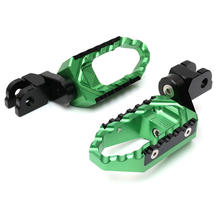 Front view of MC Motoparts 25mm extension touring foot pegs for Kawasaki ZX10R and ZX6R, with black multi-step design and mounting hardware.