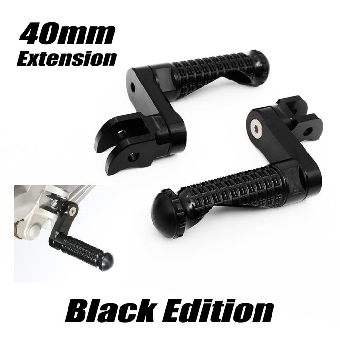 Black MC Motoparts 40mm extension foot pegs for Moto Guzzi V9, V7, V100 Black Shadow motorcycle, front view showing textured surface