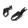 MC Motoparts 40mm extension foot pegs for Moto Guzzi V9, V7, V100 TRC touring models, featuring adjustable wide footrests.