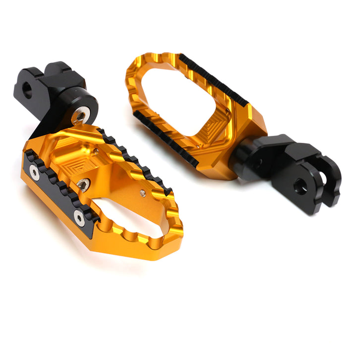 Black MC Motoparts 25mm wide extension foot pegs for Suzuki GSX-R 1000, 600, 750 touring motorcycle, front view.