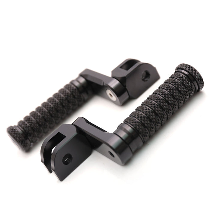 Black 40mm extension foot pegs for Suzuki GSX-R 600, 750, 1000 motorcycles by MC Motoparts, shown from the front angle.
