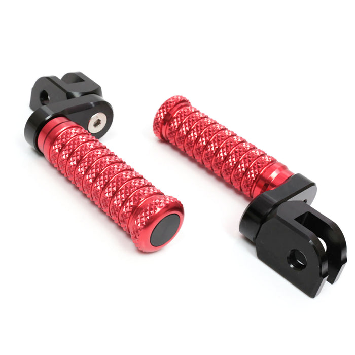 Front view of MC Motoparts 25mm extension foot pegs for Triumph Scrambler 1200 and Trident 660 motorcycle, showing polished metal footrests.
