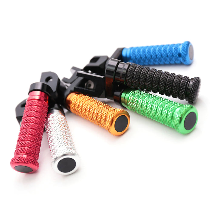 Front view of MC Motoparts 25mm extension foot pegs for Triumph Scrambler 1200 and Trident 660, showing durable metal construction.