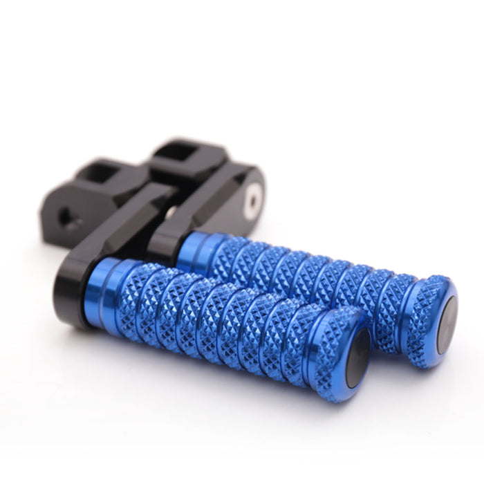 MC Motoparts 40mm extension foot pegs for Triumph Scrambler and Tiger 955i, designed for lower riding position and improved comfort.