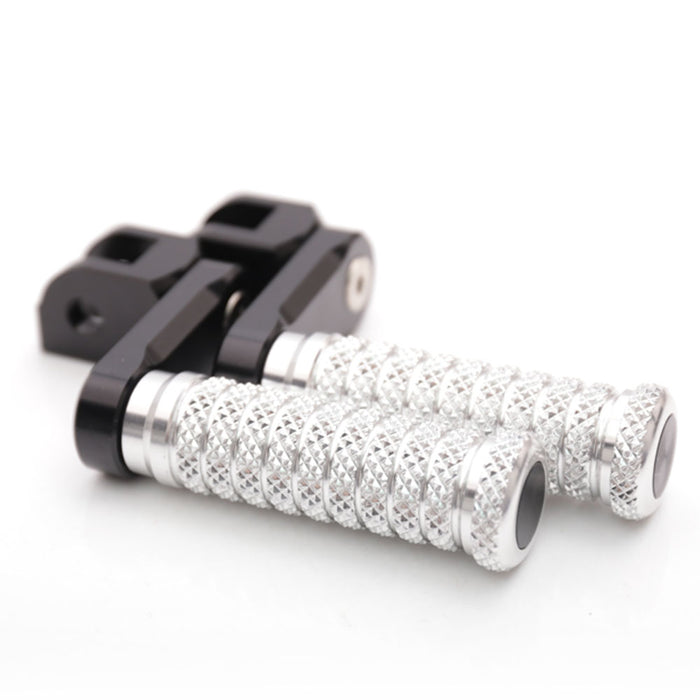 Front view of MC Motoparts 40mm extension foot pegs for Triumph Scrambler Tiger 955i Spring GT motorcycle.