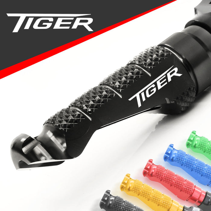 Black engraved logo R-FIGHT front foot pegs for Triumph Tiger motorcycle by MC Motoparts, featuring standard metal construction.