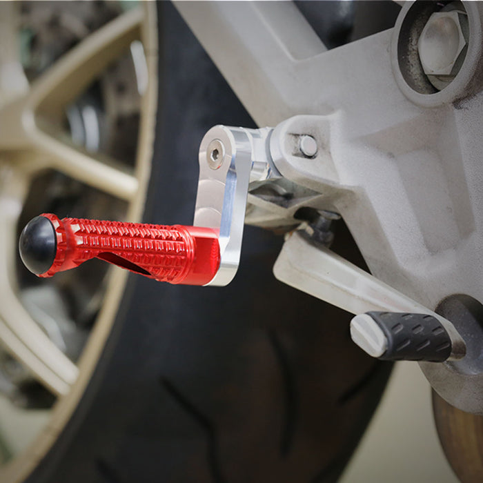 MC Motoparts 40mm extension foot pegs for Triumph Trident 660 and Scrambler 1200, adjustable motorcycle foot pegs installed