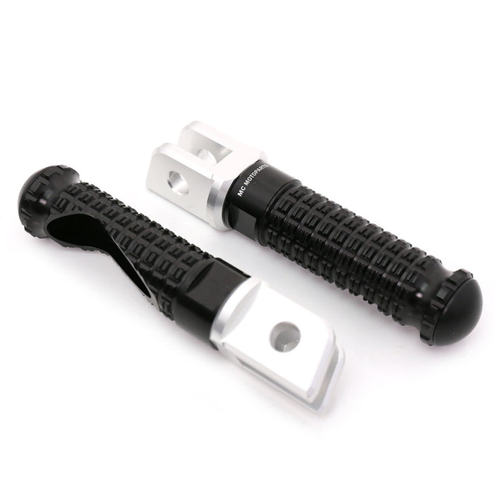 Black MC Motoparts standard foot pegs for Yamaha YZF R1 R3 R6 R25 and R125 motorcycles, mounted on a bike.