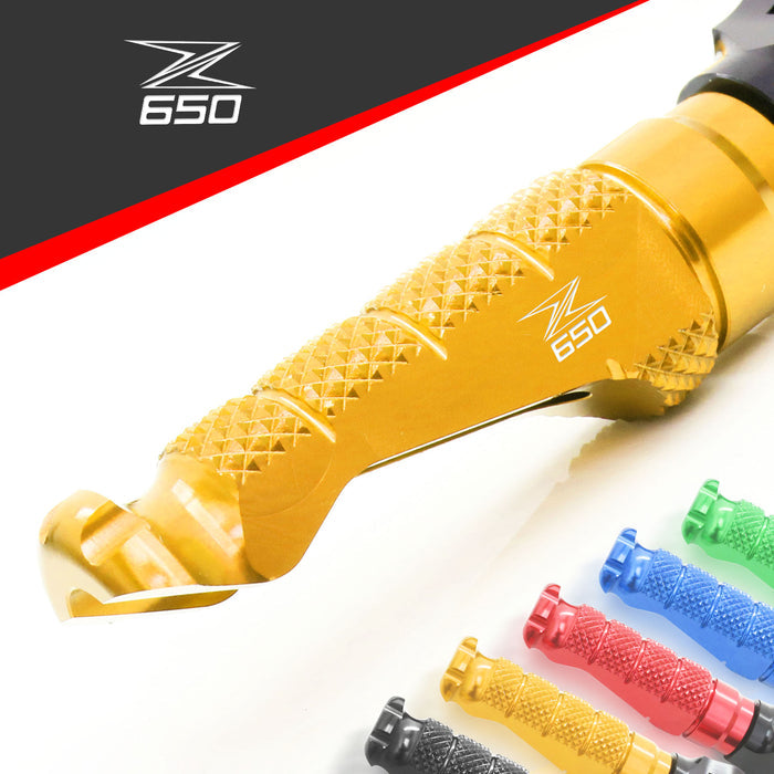 Kawasaki Z650 2017-2026 R-FIGHT front foot pegs with engraved logo by MC Motoparts, standard motorcycle foot pegs.