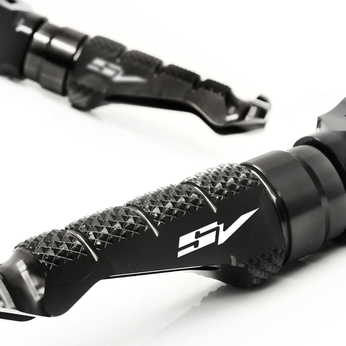 Suzuki SV650 SV1000 front R-FIGHT engraved logo standard foot pegs by MC Motoparts, black metal motorcycle footrests.