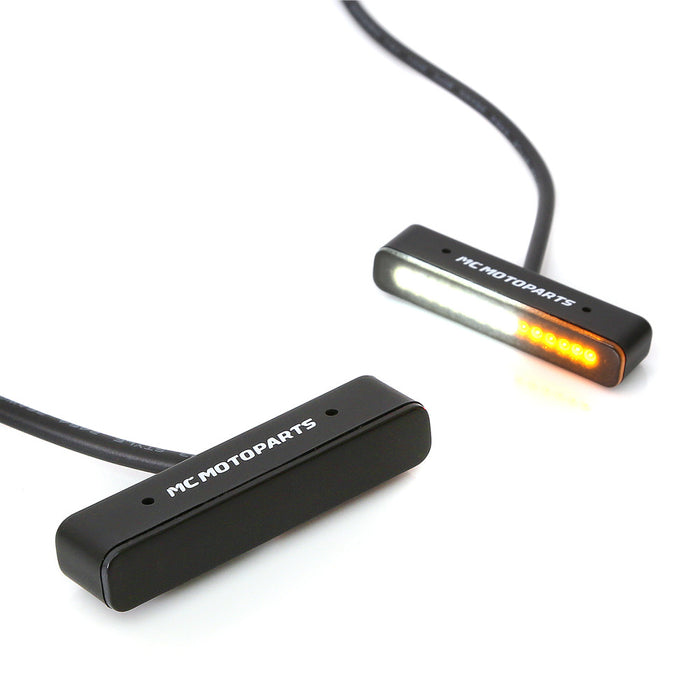 Mini LED front running turn signal lights by MC Motoparts, white and yellow LED signal lights for motorcycle safety.