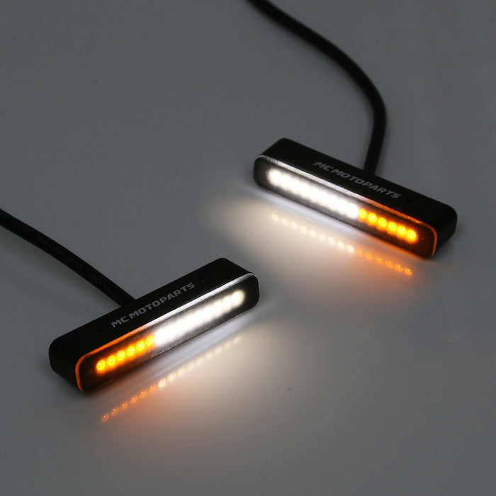 Mini LED front running turn signal lights by MC Motoparts, white and yellow LED signal lights for motorcycle visibility.