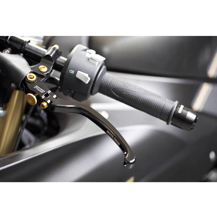 Moto-Tron lightweight racing folding clutch lever installed on Kawasaki ZX12R motorcycle, showing sleek black metal design.